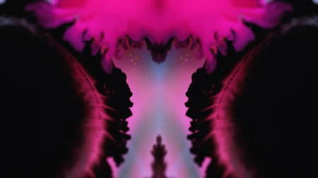 Paint spill abstract background pink black flowの写真素材