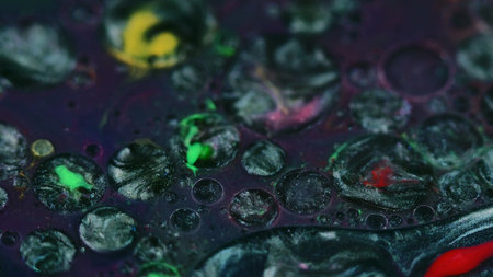 Ink mix background glitter dye metallic purpleの写真素材