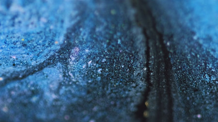 Glitter paint flow ink water mix blue black fluid