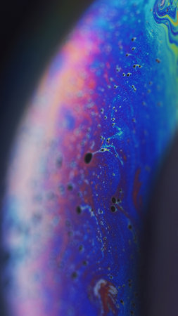 Paint mix bubble fluid blue yellow oil ink flowの写真素材