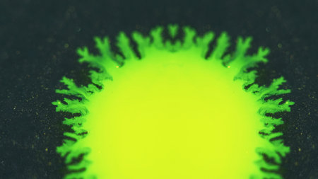 Ink drop paint splatter neon yellow green blotch