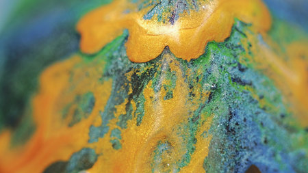 Glitter fluid background flow yellow green blue