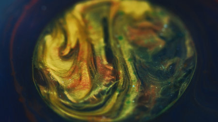 Glitter bubbles oil blob golden blue paint dropの写真素材