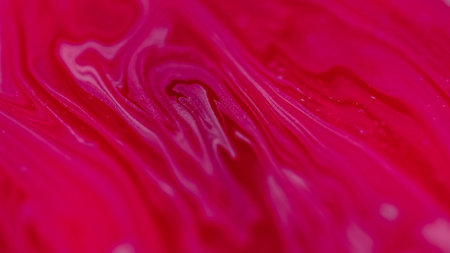 Paint swirl glitter liquid mix pink red blendの写真素材