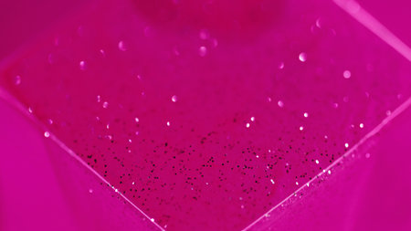Glitter ink shimmering spill pink paint gel cubeの写真素材