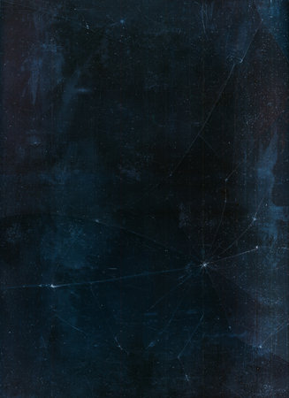Broken texture. Distressed overlay. Old film noise. White dust scratches dirt stains weathered fractured glass effect on dark blue grunge illustration abstract background.の写真素材