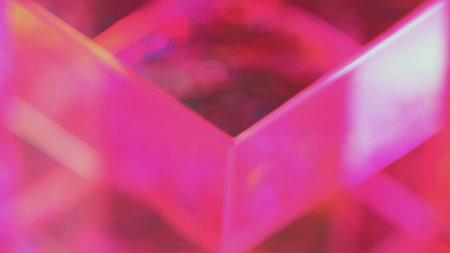 Bokeh crystal. Colorful illumination. Defocused pink neon lights passing through glass prism purple...