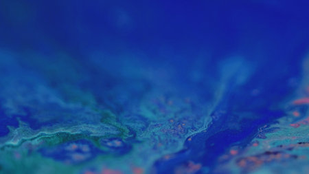 Color fluid. Shiny paint wave. Defocused blue green pink shimmering texture ink emulsion flow abstract art background.の写真素材