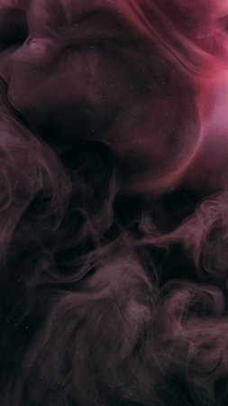Paint water splash. Glitter mist texture. Defocused pink black color shimmering particles explosion vapor cloud floating dark abstract art background.の写真素材