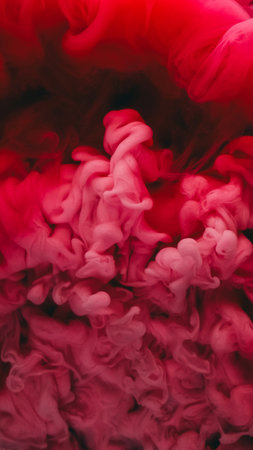 Paint water splash. Vapor cloud. Defocused pink red color shimmering particles explosion smoke floating abstract art background.の写真素材