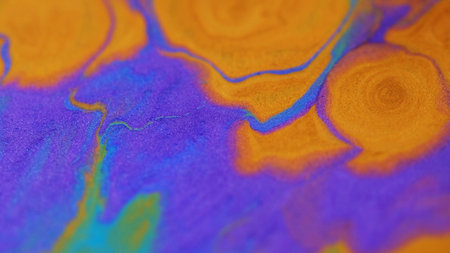 Paint drop. Glitter fluid texture. Blur purple orange golden cyan color shimmering metallic sand...
