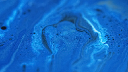 Paint bubbles. Fizzy liquid texture. Defocused blue color sparkling particles emulsion blend spill flow abstract art background.の写真素材