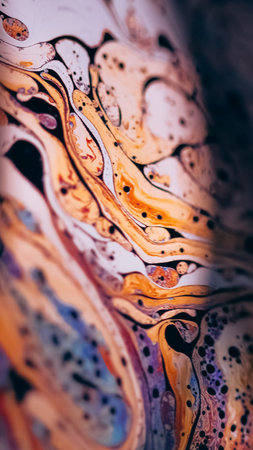 Psychedelic dye. Gasoline fluid. Defocused pink orange blue color rainbow curve acrylic slick on...