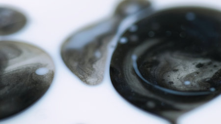 Blur bubbles. Glitter blob. Defocused black white shimmering particles droplets floating acrylic texture ink water flow abstract art background.の写真素材