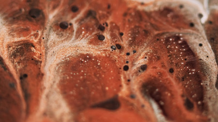 Acrylic mix. Paint drip. Defocused brown white black color shimmering texture gel emulsion blend bubbles wave abstract art background.の写真素材