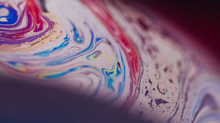 Oil fluid stain. Blur ink mix. Defocused purple pink blue yellow color acrylic emulsion bubbles wave...