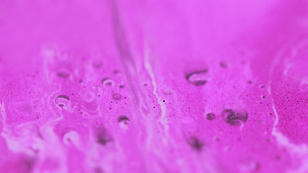 Blur foam. Oil emulsion. Defocused magenta pink black color acrylic texture paint droplets drip blend flow abstract art background.の写真素材