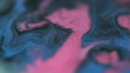 Bokeh sparkles. Fluid spill. Blur pink blue black color shimmering texture layers wave flow bokeh...