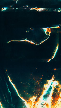 Old film overlay. Damaged foil. Burn surface texture. Blue orange green color light flares dust...