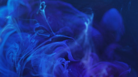 Dream cloud. Shining color. Defocused bright blue splash paint ink mist magic smoke moving on abstract modern art background.の写真素材