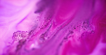 Sparkling blend spill. Glitter ink wave. Blur magenta pink purple color oil texture paint mix flow abstract art background.の写真素材