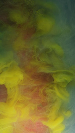 Burn mix. Ink water explosion. Blue yellow blue color flow swirl acrylic steam clouds fume fog vapor...