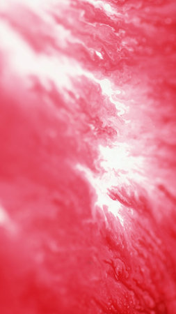 Smooth dripping. Blur paint flow. Defocused pink white color shiny glowing viscous texture ink water mix on abstract light art background.の写真素材