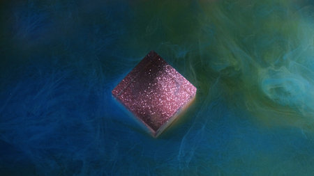 Splash water ink. Glow sparks texture. Blue green multicolor flow smoke paint sparkling glitter purple cube cloud on art shimmer light background.の写真素材