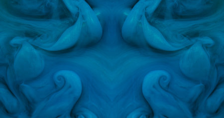 Paint splash. Smoke background. Defocused blue color twirling in water spray shiny wet particles soaring on creative art abstraction.の写真素材