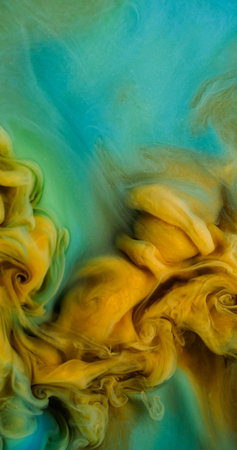 Color smoke texture. Paint water. Defocused blue yellow green cloud splash glitter mix liquid soaring on abstract background.の写真素材