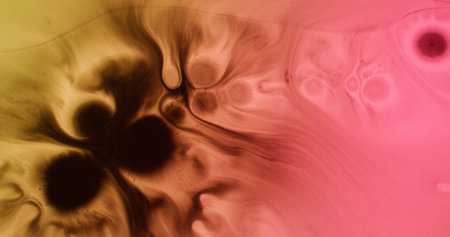 Grunge blob. Wet paper ink. Black pigment fluid drop pink orange background. Dirty splash spilling...