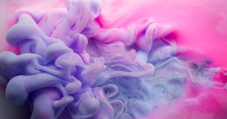 Art fog. Cloud dye. Colorful fume emulsion curl stream blending pigment. Purple pink liquid paint spill abstract fluid defocused background.の写真素材