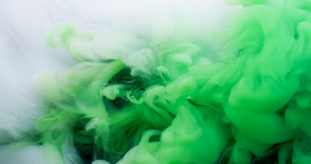 Magic fume. Paint blend. Green white swirl mystery stream. Color pigment dissolving art defocused abstract black background floating wave.の写真素材
