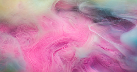Art fog. Cloud dye. Colorful fume emulsion curl stream blending pigment. Pink liquid paint spill abstract fluid defocused background.の写真素材