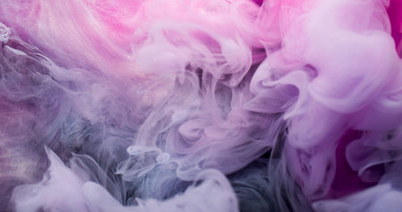 Smoke splash. Steam flow. Pink white pigment haze dissolve in water. Art abstract curl ink blend color defocused background texture.の写真素材