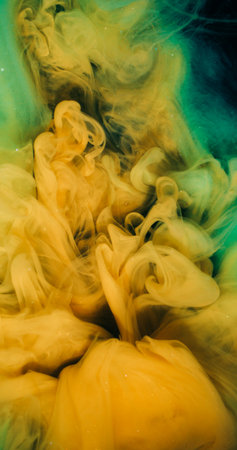 Cloud splash. Ink colorful fluid. Yellow green mist explosion paint flow. Art fog spill defocused color water fantasy blend background.の写真素材