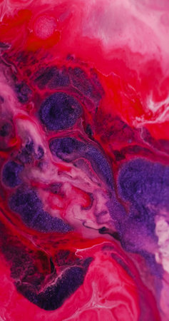 Shimmer fluid. Ink particles. Defocused purple red blue colorful water glitter acrylic liquid flowing on abstract art wet background.の写真素材
