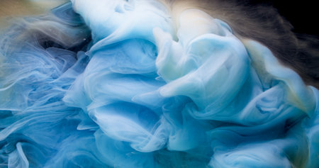 Wave texture. Paint cloud. Defocused blue color ink in water fume fog on abstract acrylic creative dark black background.の写真素材