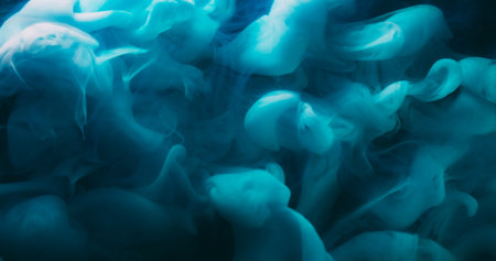 Ink fog. Fume paint. Blur blue color liquid blend fume swirling particles splash steam growing on...