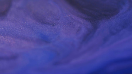 Ripple paint. Shiny fluid. Blur blue purple color dust chemical flow dark black stains spreading on abstract acrylic art background.の写真素材