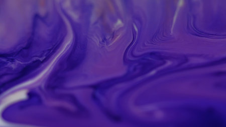 Chemical pigment. Wet texture. Blur blue purple colorful paint flowing in water acrylic splash floating on abstract background.の写真素材