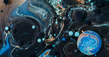 Bubble art. Ink water. Defocused blue orange color dark black purple round oil texture glitter acrylic flow floating on abstract background.の写真素材