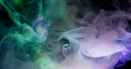 Underwater mist. Acrylic splash. Defocused blue purple colorful ink cloud texture glitter liquid floating on abstract pink background.の写真素材