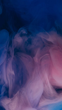 Mix color. Flowing paint. Defocused blue pink smoke ethereal vapor water wet splash liquid flying on...