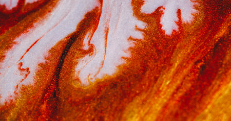 Blur pigment blend. Paint flow. White blob wave dissolving on sparkling red orange lava. Abstract...