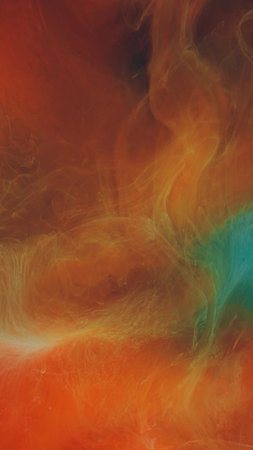 Fume haze. Underwater ink. Defocused blue orange colorful paint in water cloud fluid liquid floating on ethereal chemical background.の写真素材