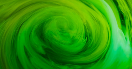 Paint vortex. Green swirl vapor. Blur blue color glitter acrylic fume smoke round texture twirl on abstract bright background.の写真素材
