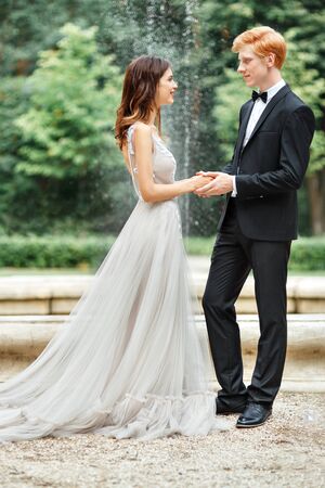Newlyweds hold hands andの写真素材