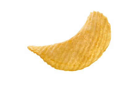 Single potato chip on white background close-up isolatedの写真素材