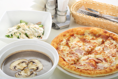 mushroom soup salad and pizzaの写真素材